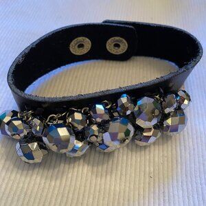 Bracelet - leather strap with fun, metallic, cut beads